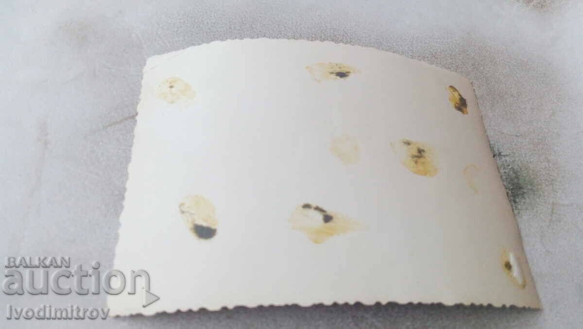 Photo Newlyweds with their friends on the street with price 1.35 BGN | € 0.69