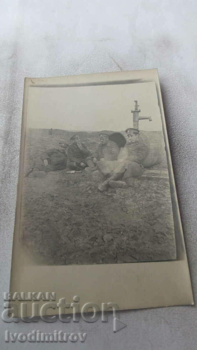 Mrs. Officer and soldiers of 53 p. osog. regiment to a fountain at the front Mrs. Officer and soldiers of 53 p. osog. regiment to a fountain at the front