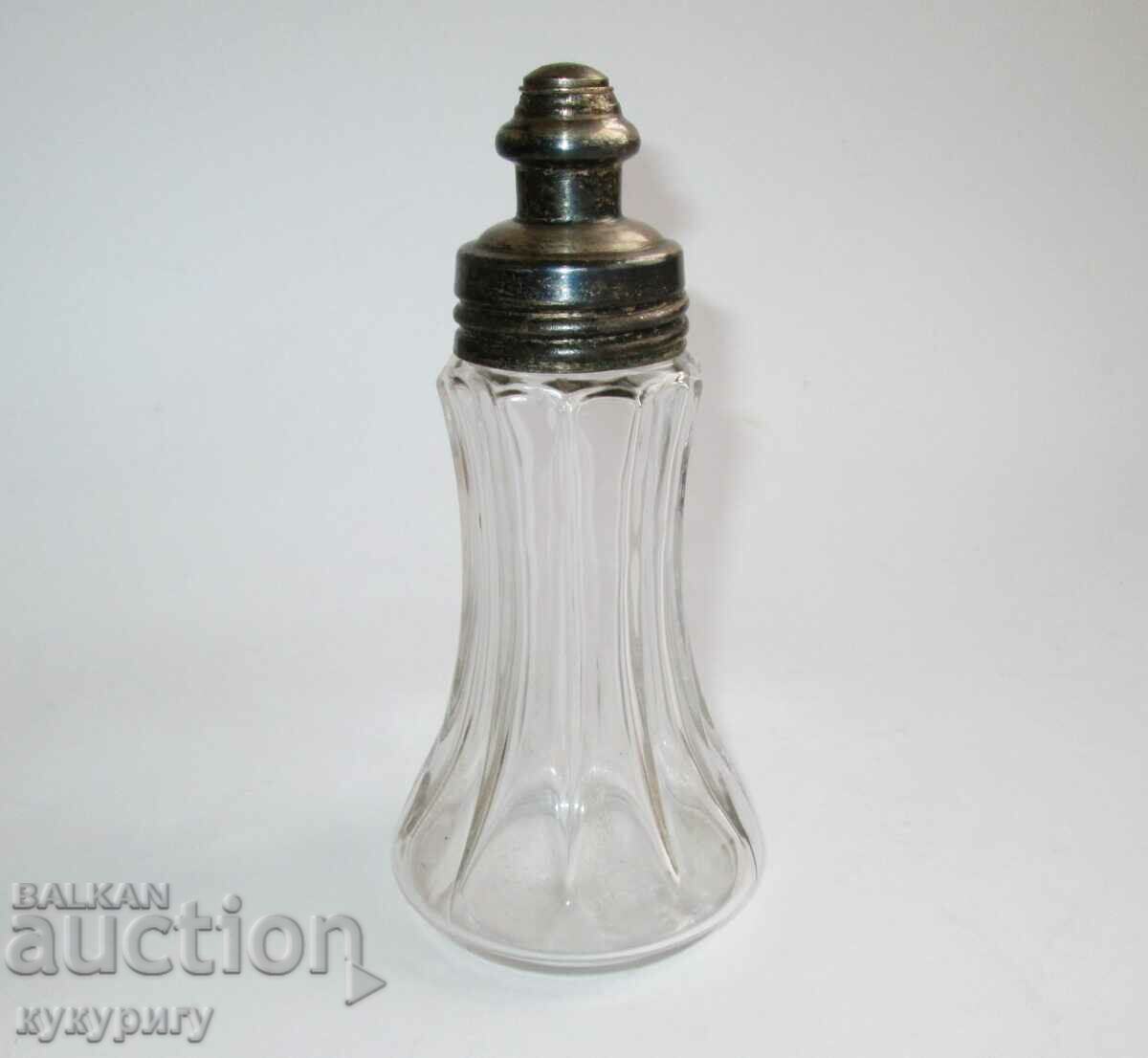 Old vintage perfume or cologne bottle with dispenser