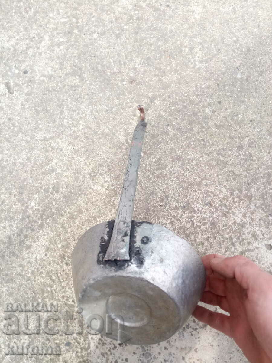 Delivery of An old copper ladle Delivery of An old copper ladle