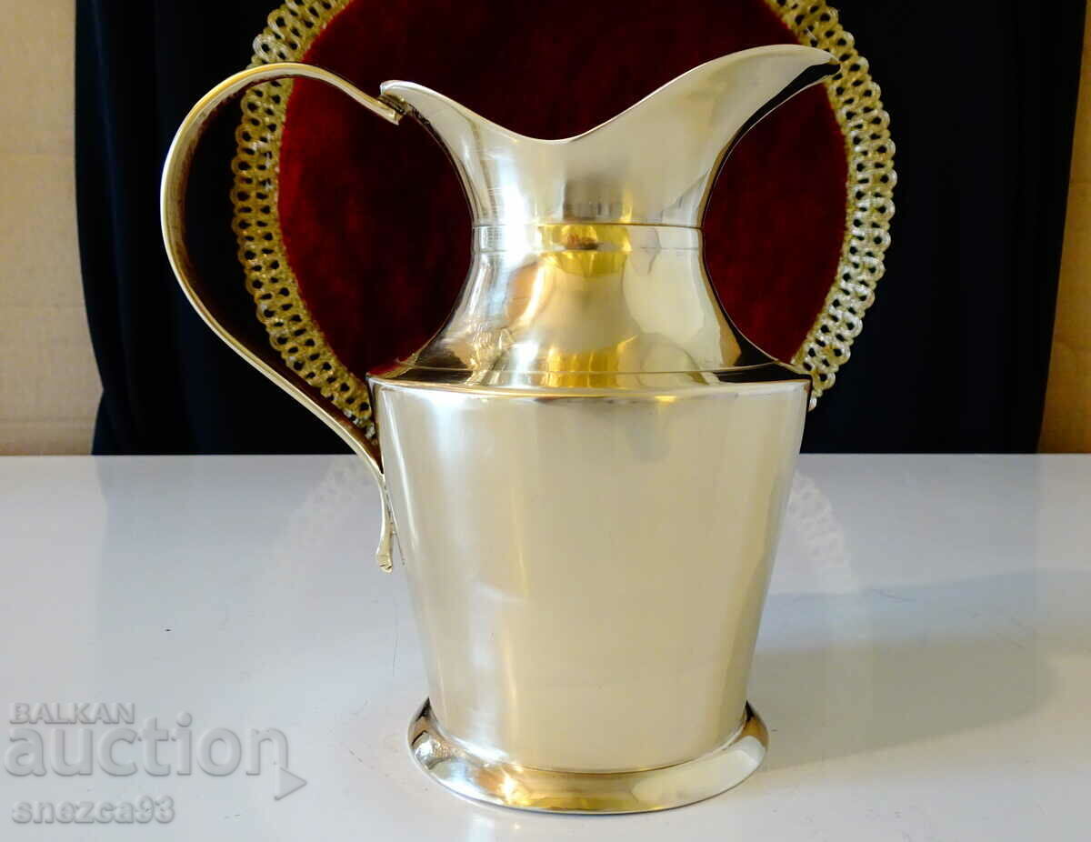 Auction Bronze jug for brandy, classic. Auction Bronze jug for brandy, classic.