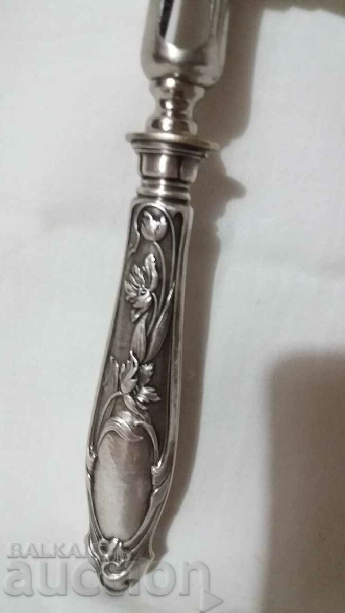Delivery of Antique appliance utensil tool with silver handle