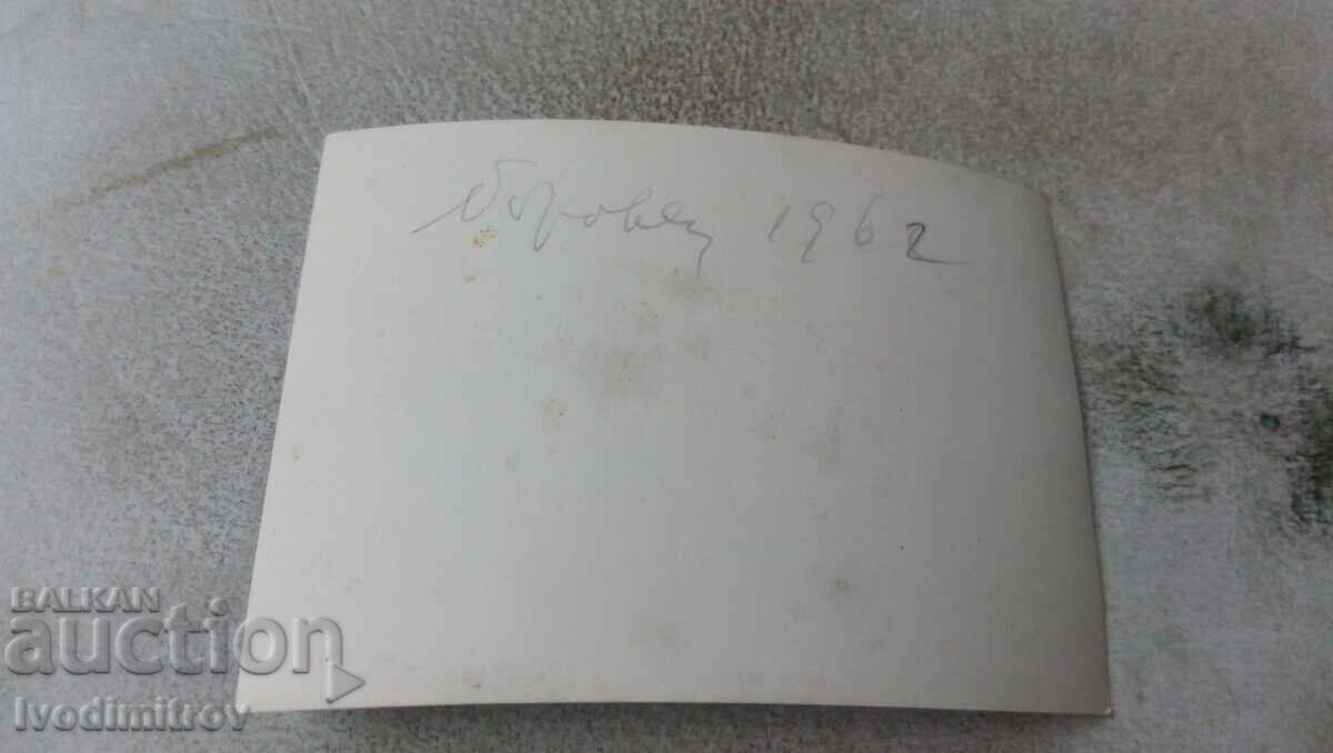 Photo Two men and a woman with a Moskvich car on the road with price 1.45 BGN | € 0.74