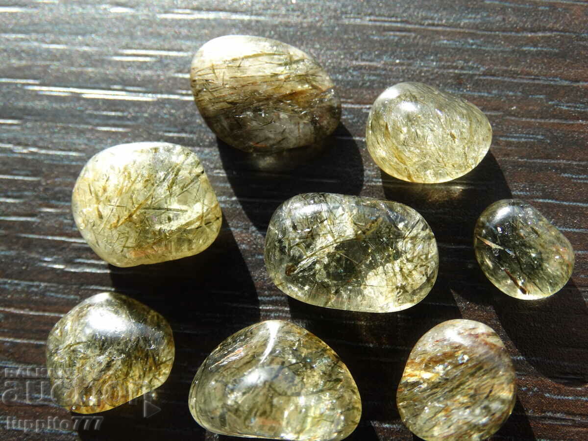 Auction 74.65 carats of natural rutilized quartz, 8 pieces Auction 74.65 carats of natural rutilized quartz, 8 pieces