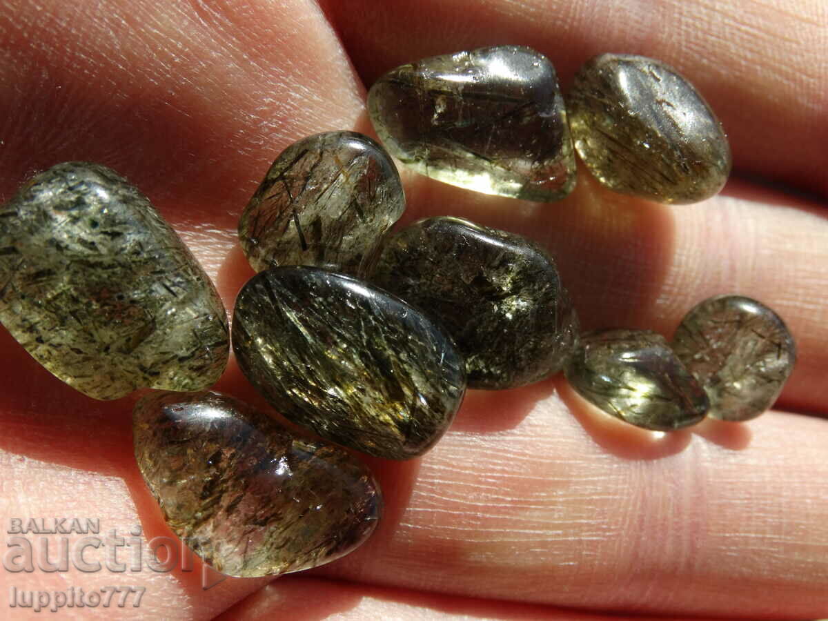 Auction 76.60 carats of natural rutilized quartz 9 pieces Auction 76.60 carats of natural rutilized quartz 9 pieces