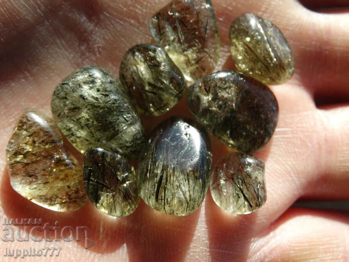 Delivery of 76.60 carats of natural rutilized quartz 9 pieces Delivery of 76.60 carats of natural rutilized quartz 9 pieces