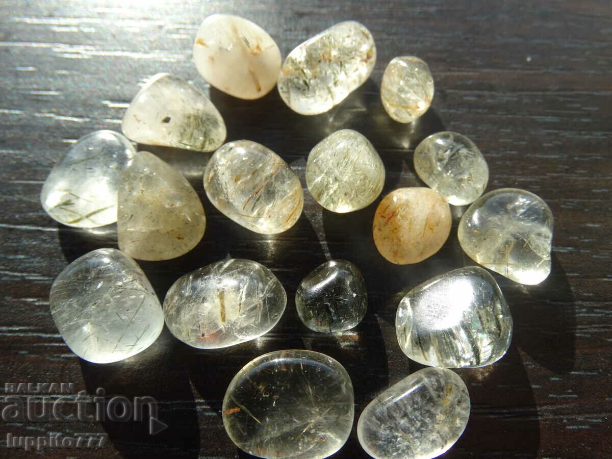 111.40 carats of natural rutilized quartz 17 pieces