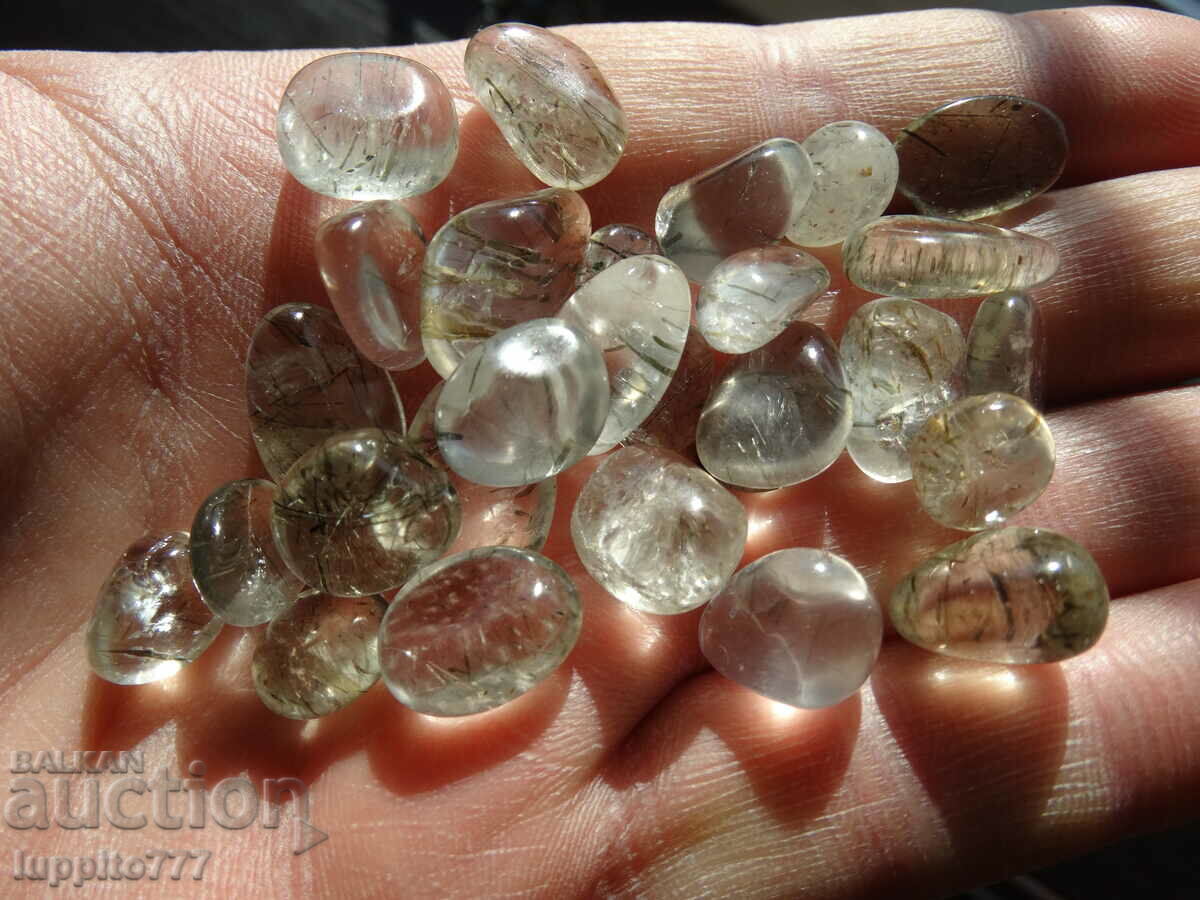 224.20 carats of natural rutilized quartz 28 pieces