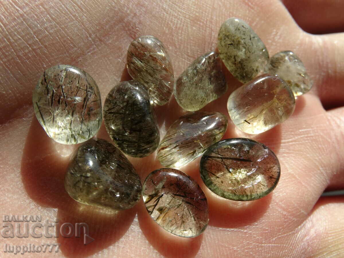 68.25 carats of natural rutilized quartz 11 pieces