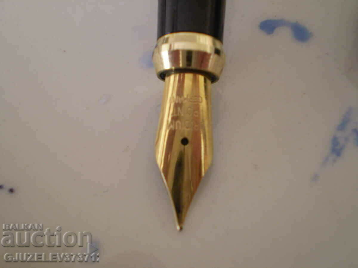 Auction Pen with writing on the pen "Iridium Point Germany Auction Pen with writing on the pen "Iridium Point Germany