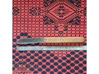 Un vechi cuțit de electrician.