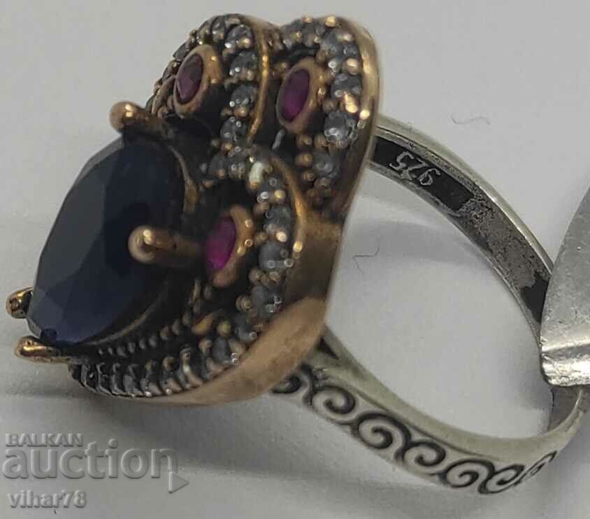 Сребърен пръстен със сапфир и рубини с цена 219.99 лв. | € 112.48 Сребърен пръстен със сапфир и рубини с цена 219.99 лв. | € 112.48