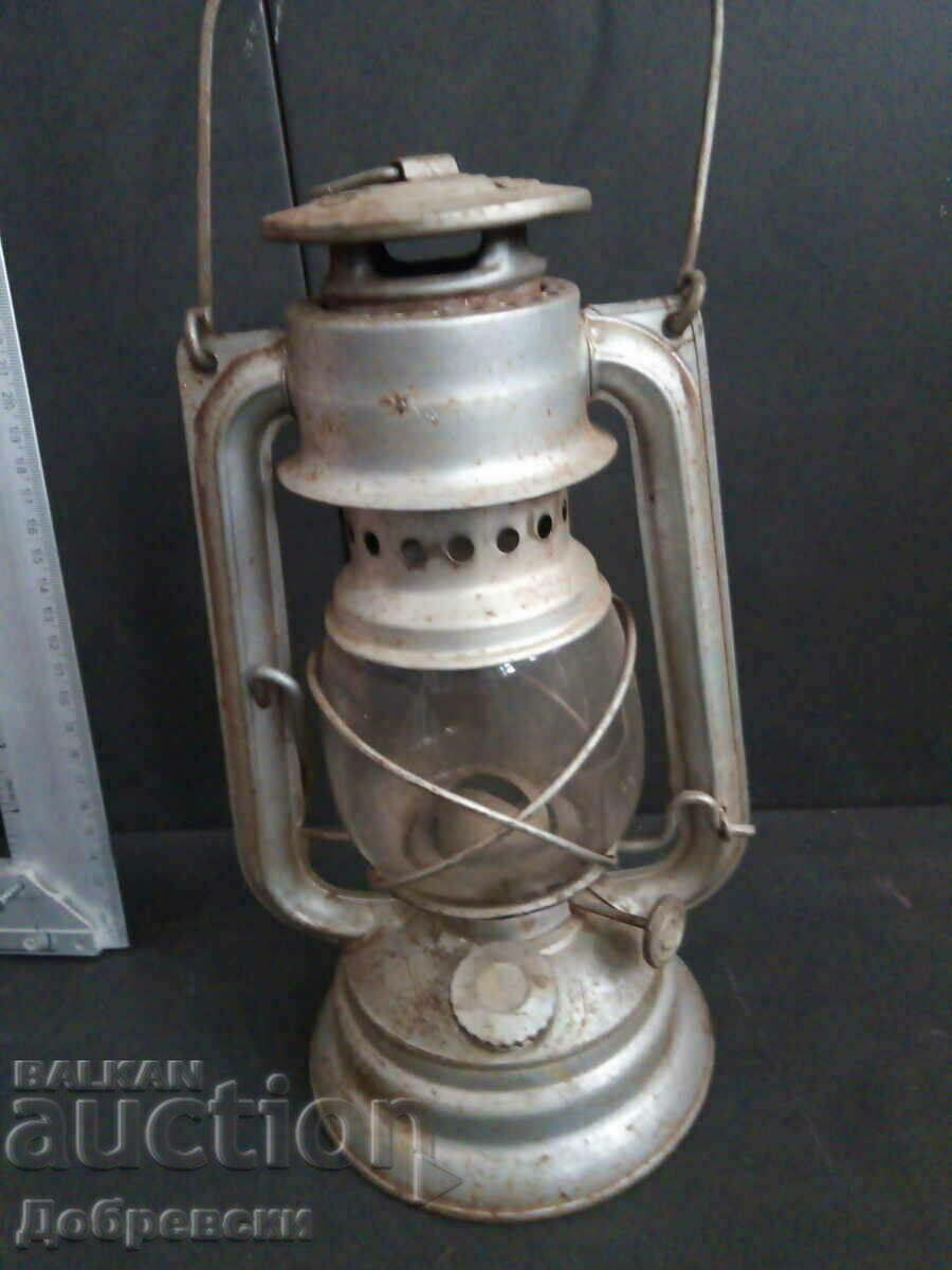 Gas lantern, lamp.