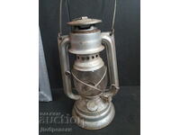 Gas lantern, lamp.