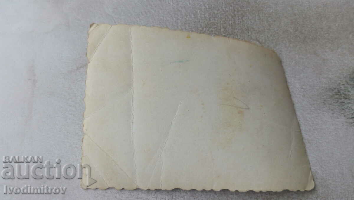 Photo A man in a tank top lying on the grass with price 1.65 BGN | € 0.84 Photo A man in a tank top lying on the grass with price 1.65 BGN | € 0.84