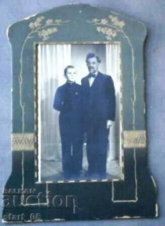Old photo in a thick cardboard frame