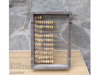 a vintage large wooden abacus from a school or shop