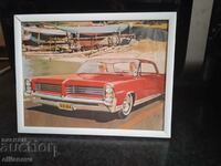 Photo of a vintage car in a frame