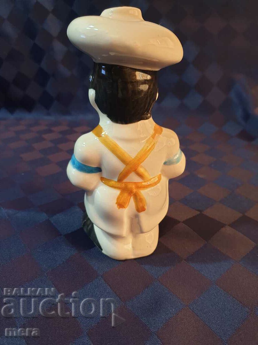Auction Porcelain figurine of a chef Auction Porcelain figurine of a chef