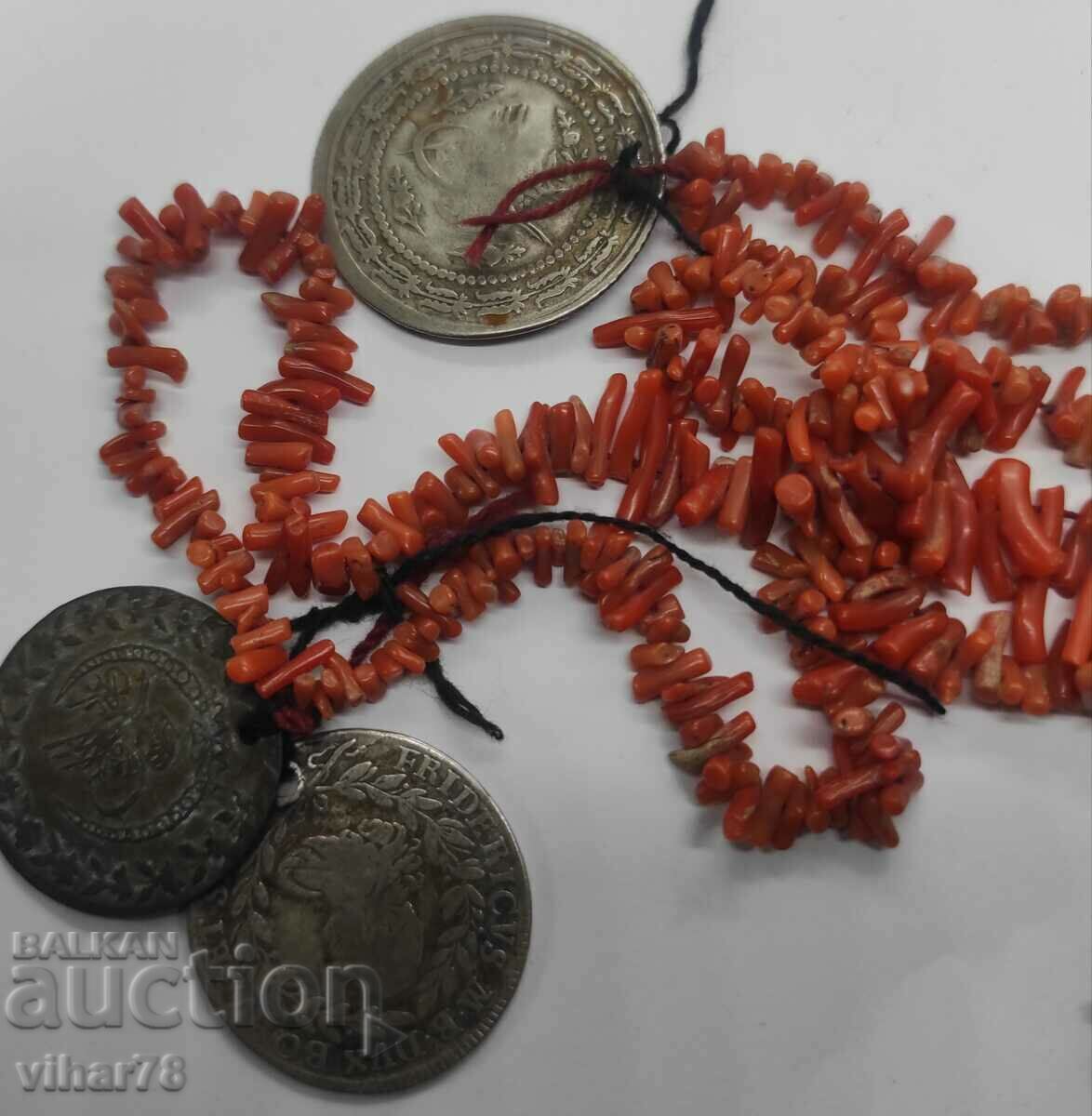 Necklace with coral and coins with price 99.99 BGN | € 51.12 Necklace with coral and coins with price 99.99 BGN | € 51.12