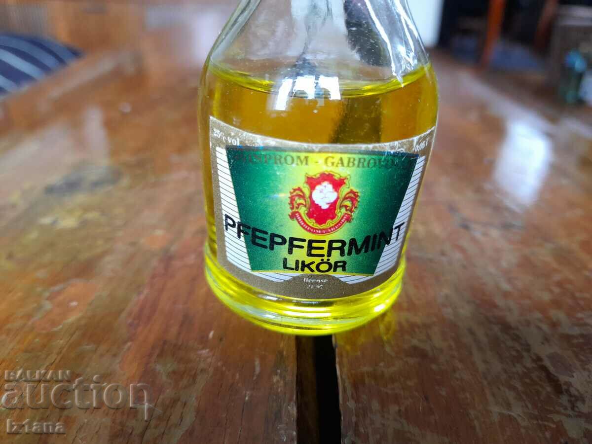 Old bottle of Pfepfermint liqueur with price 20.00 BGN | € 10.23 Old bottle of Pfepfermint liqueur with price 20.00 BGN | € 10.23