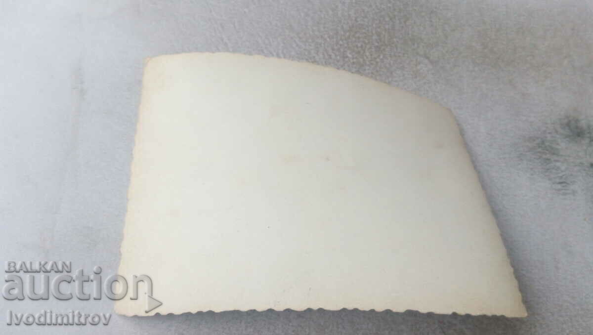 Shot Two men and two women at a table with price 0.75 BGN | € 0.38 Shot Two men and two women at a table with price 0.75 BGN | € 0.38