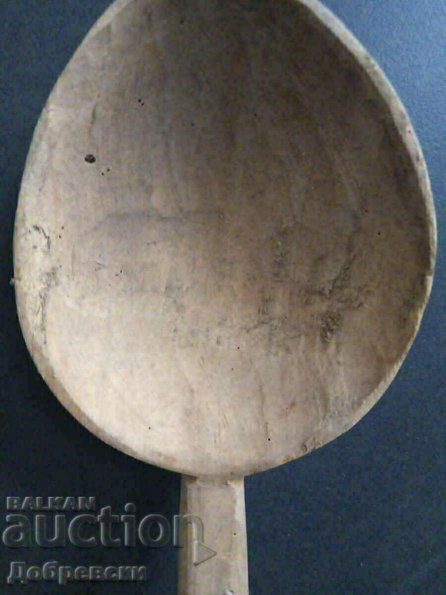 Very old wooden spoon ladle