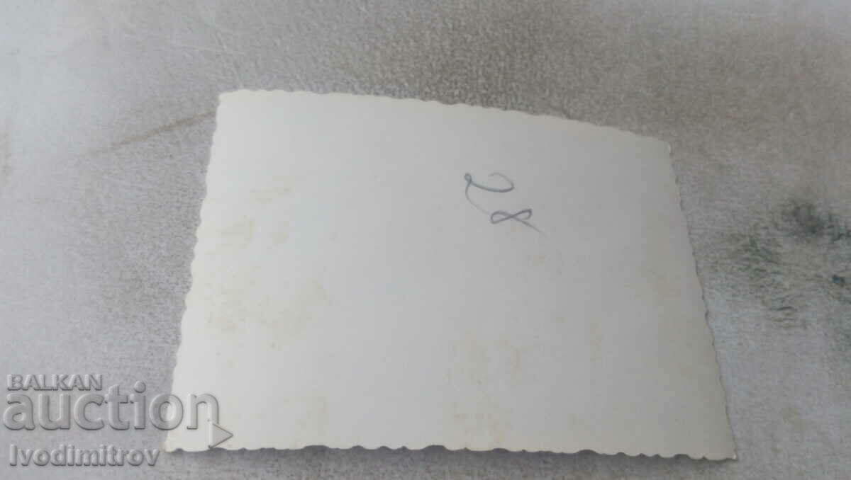 Photo Men and women in front of a monument with price 0.75 BGN | € 0.38