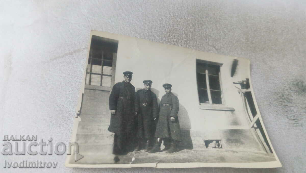 Photo Three soldiers in the barracks