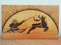 A painting from the Kola Peninsula - pyrography. Deer team.