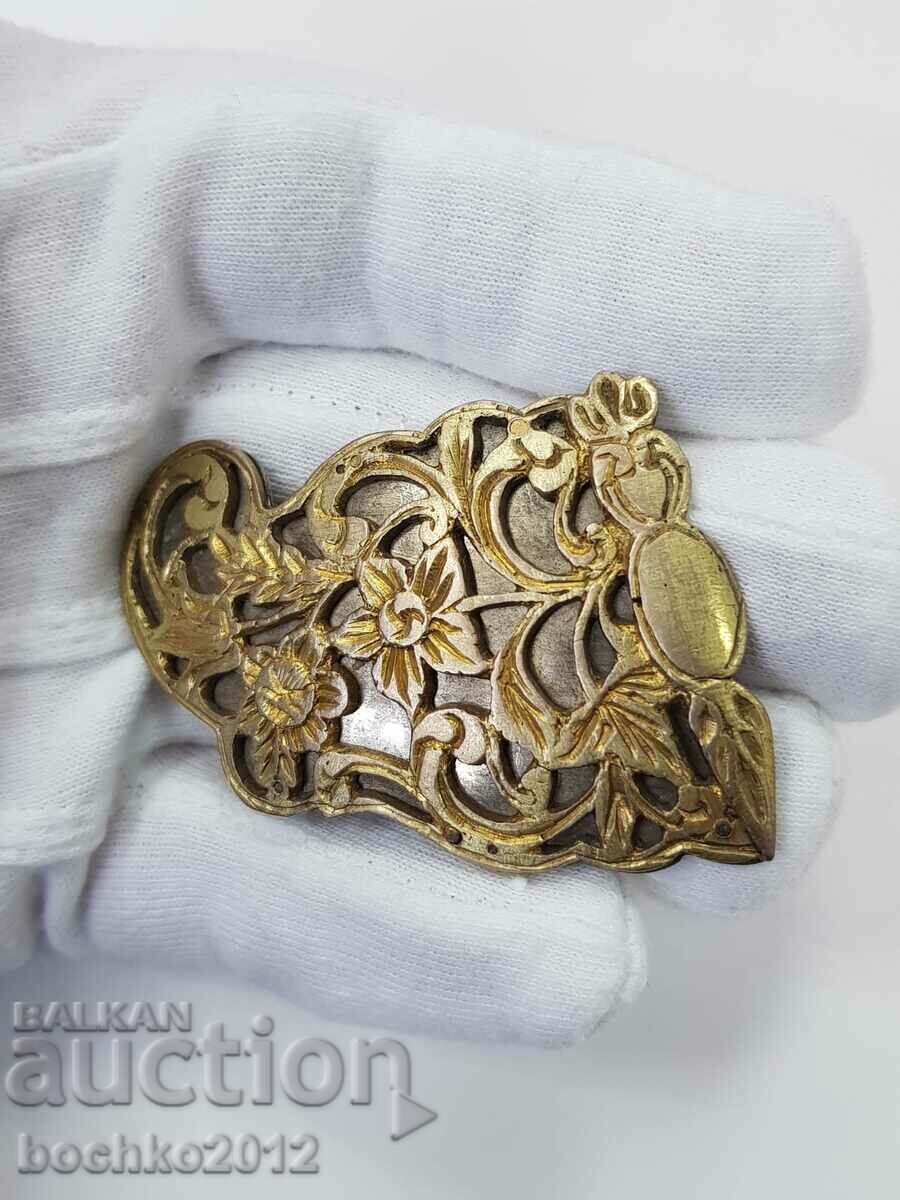 Half of a Bulgarian Revival openwork silver pafta with price 85.00 BGN | € 43.46