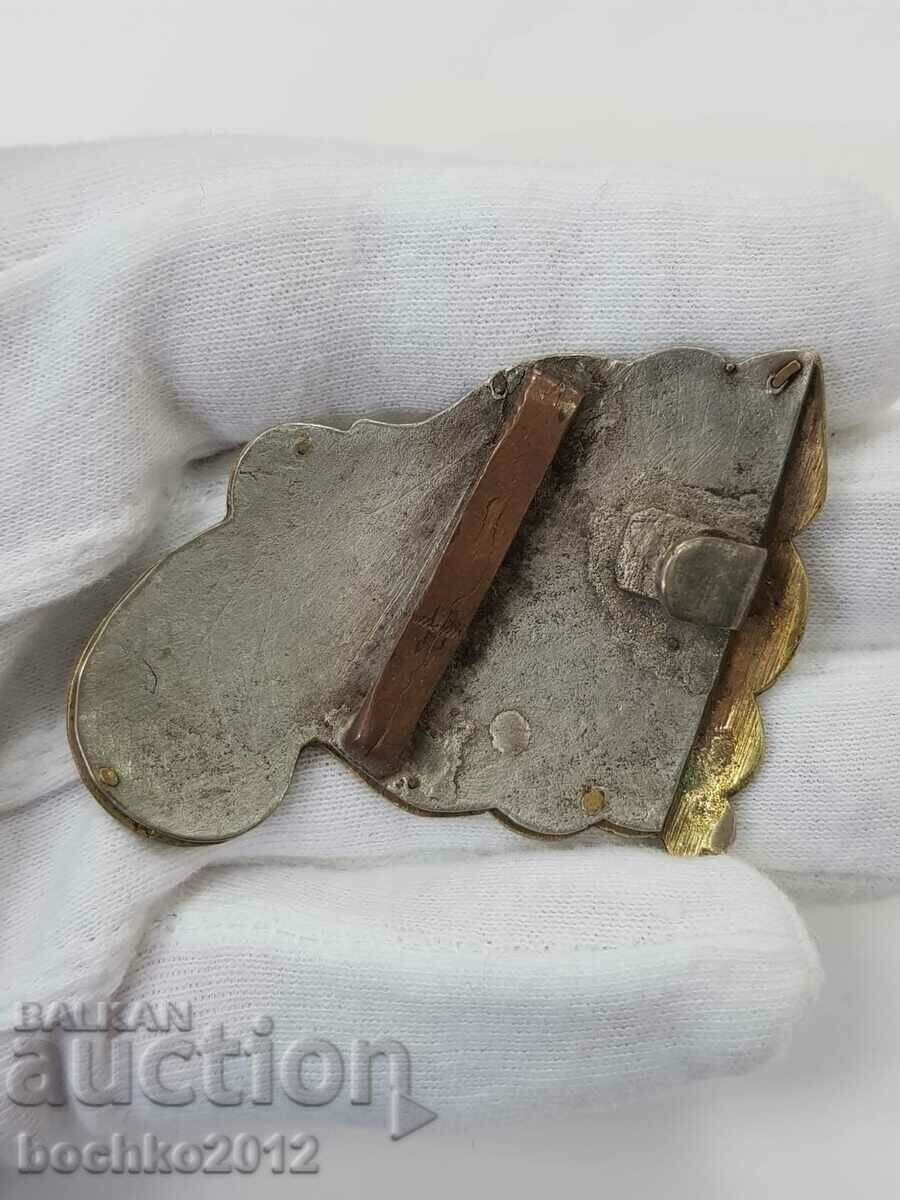 Auction  Half of a Bulgarian Revival openwork silver pafta