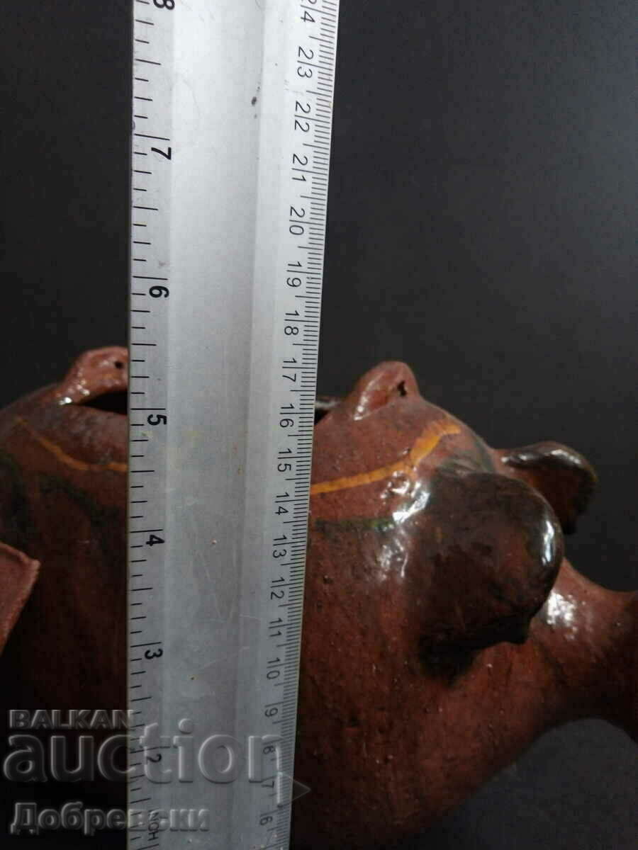 Delivery of Clay pig for baking in the oven Delivery of Clay pig for baking in the oven