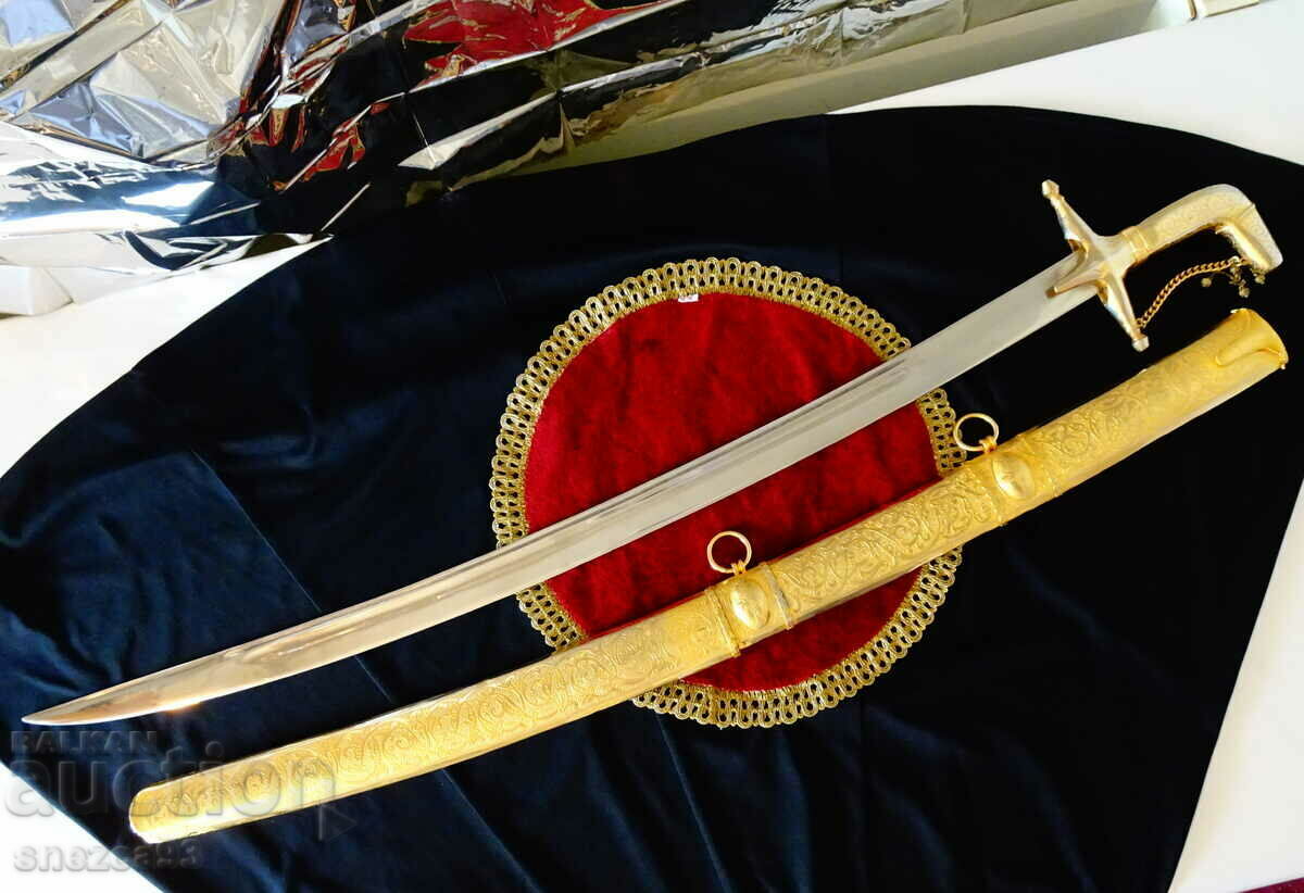 Persian saber with a handle 2 kg., thick gilding, ornaments.
