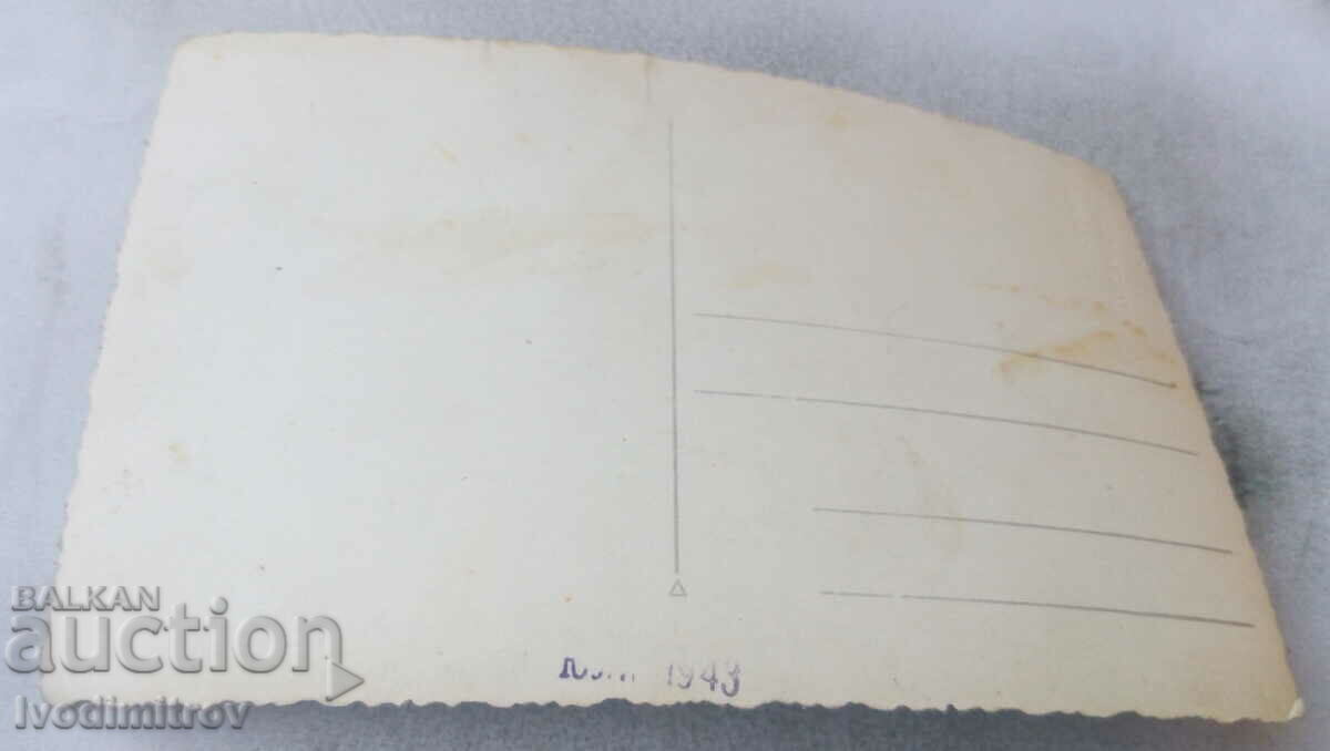 Photo Woman and three children 1943 with price 0.85 BGN | € 0.43 Photo Woman and three children 1943 with price 0.85 BGN | € 0.43