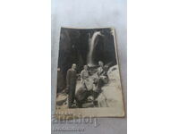 Photo Kostenets Two men and a woman in front of the waterfall