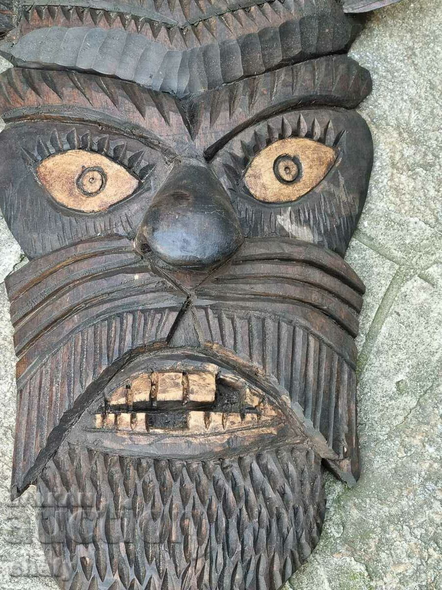 Delivery of Wood carving. Kukeri mask