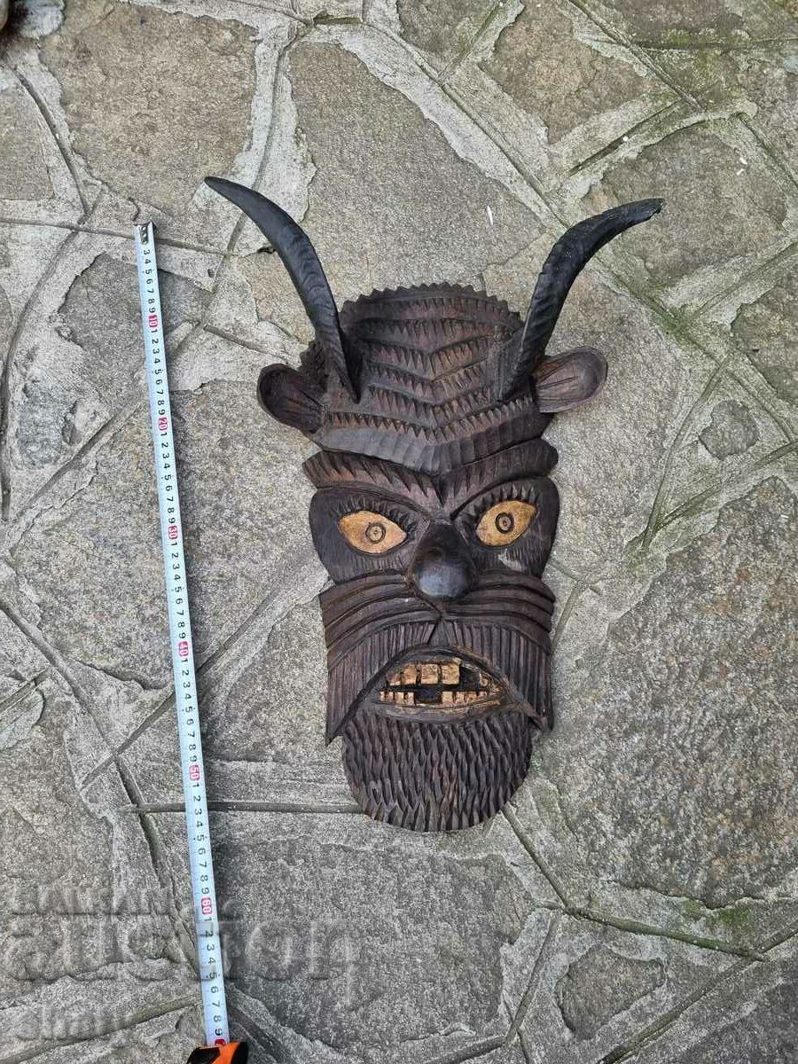 Wood carving. Kukeri mask