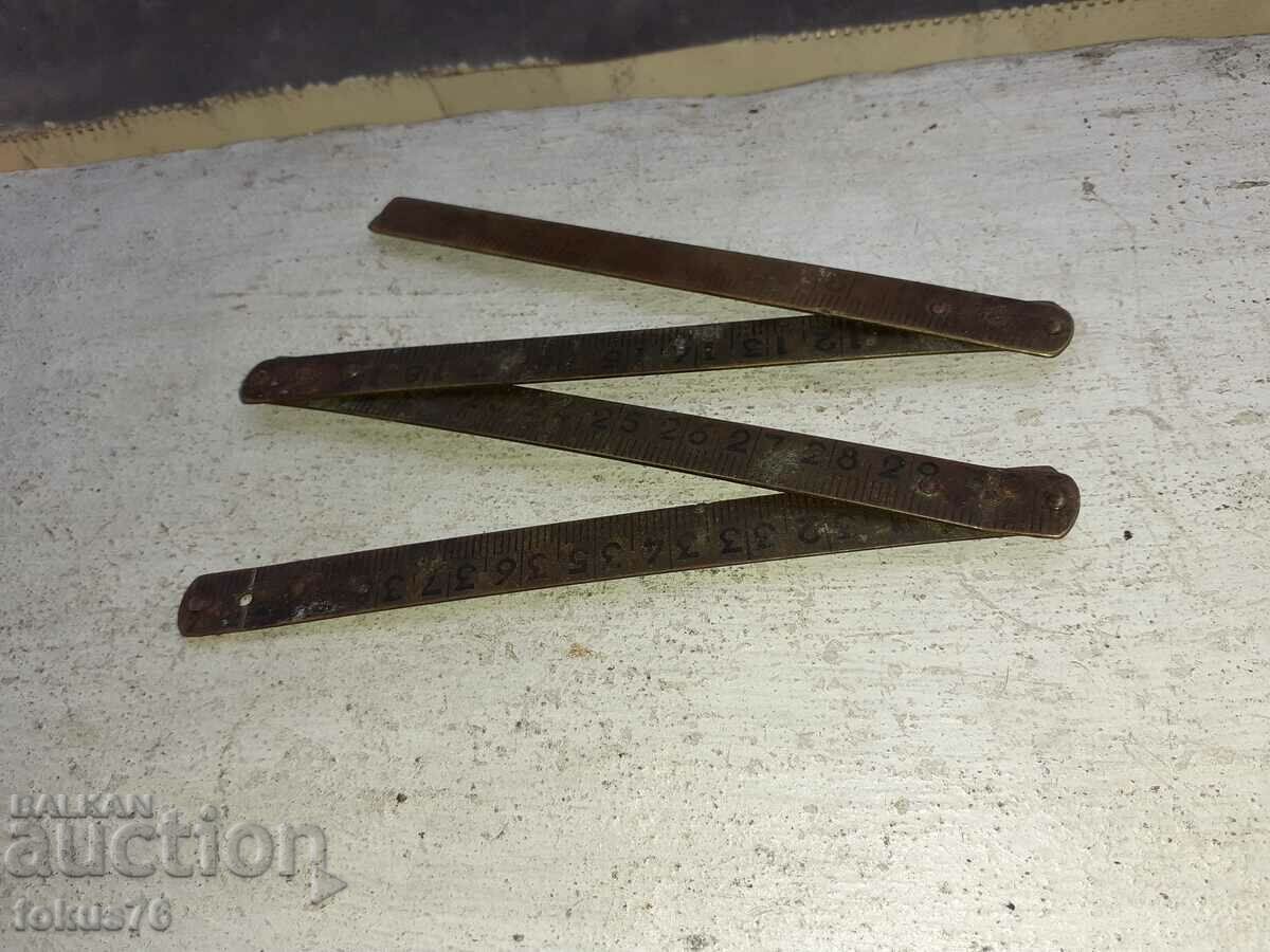 Auction Old bronze ruler Auction Old bronze ruler