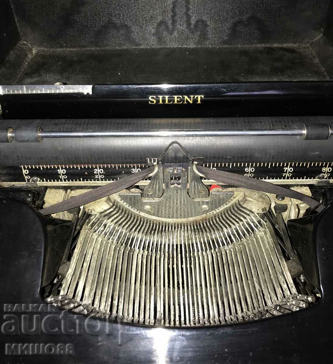 Auction Typewriter SILENT. Latin woman. Auction Typewriter SILENT. Latin woman.