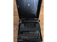 Typewriter SILENT. Latin woman.