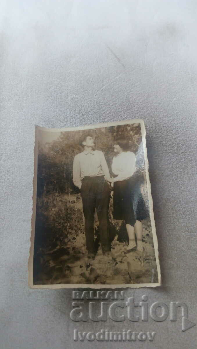 Photo of a man and a young woman