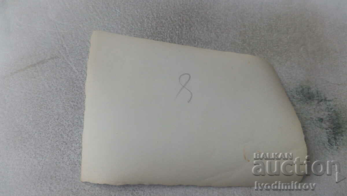 Photo Two men and two young women in front of a house with price 0.65 BGN | € 0.33 Photo Two men and two young women in front of a house with price 0.65 BGN | € 0.33