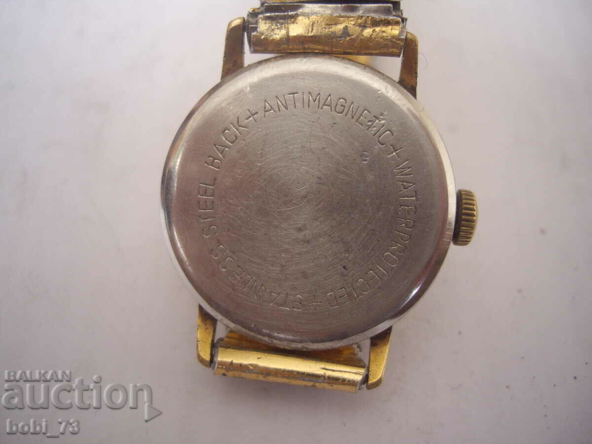 Auction  Old men's wristwatch.