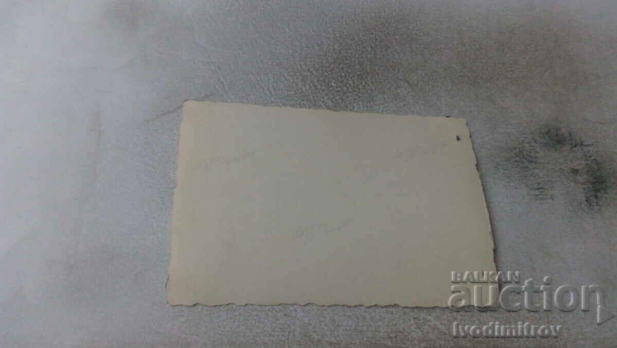 Photo Two men and two girls on a stone on the seashore with price 1.35 BGN | € 0.69 Photo Two men and two girls on a stone on the seashore with price 1.35 BGN | € 0.69