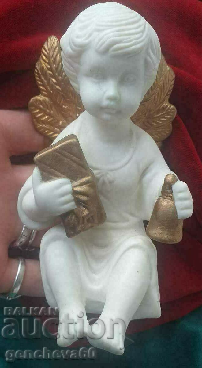 An alabaster angel figure