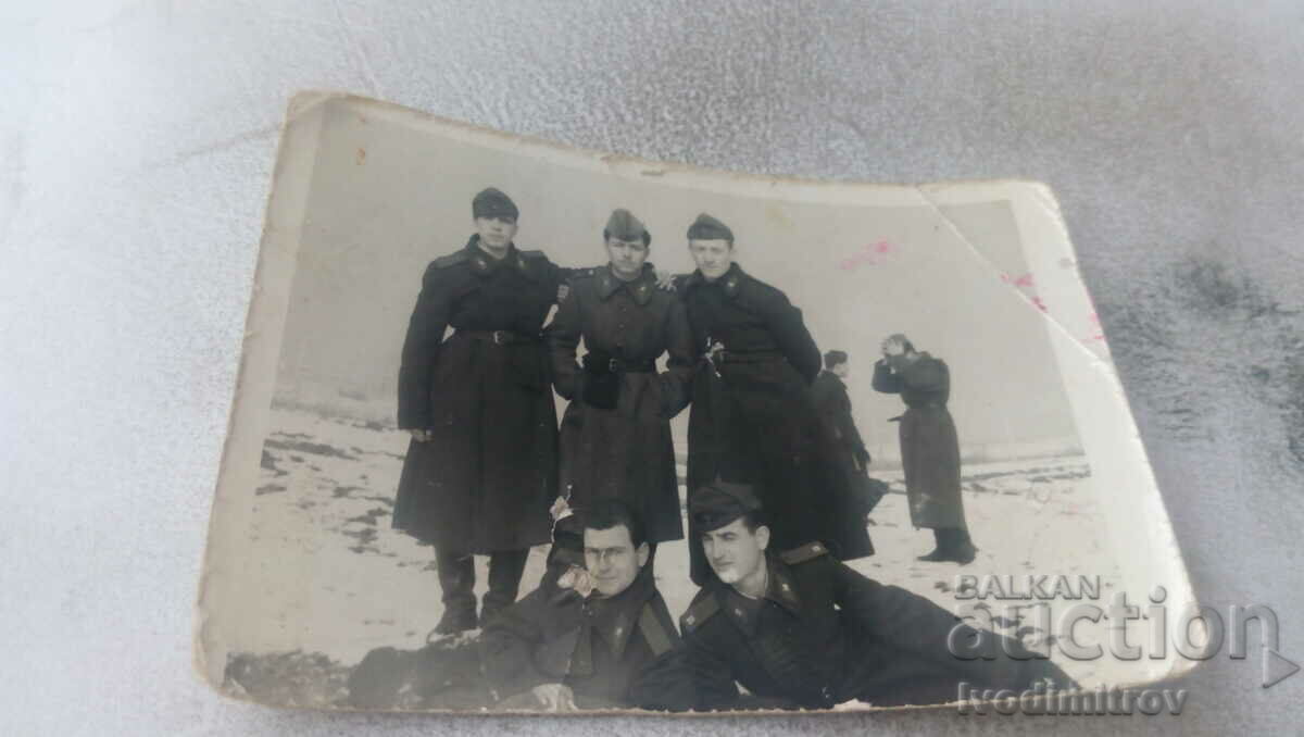Photo Five soldiers in winter