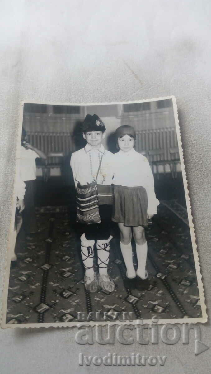 Photo Boy and girl in folk costumes