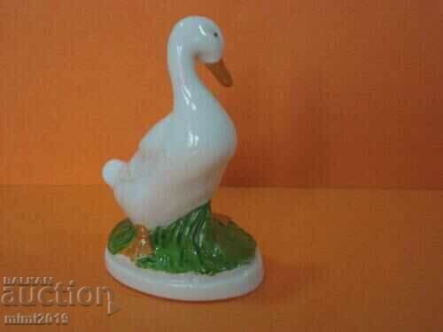 Auction An old porcelain figurine Auction An old porcelain figurine