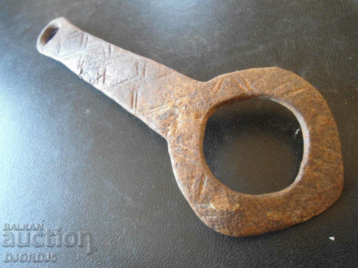 Auction  Old wrought latch, engraved